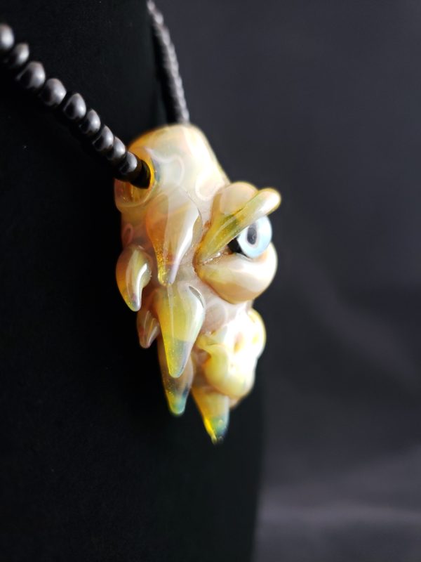 Glass Creature Face Pendant right side view