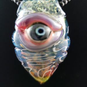 Multi colored glass creature pendant with one eye