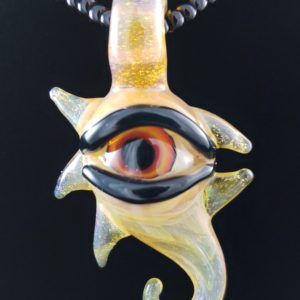 yellow red and orange eyed glass sea horse creature pendant