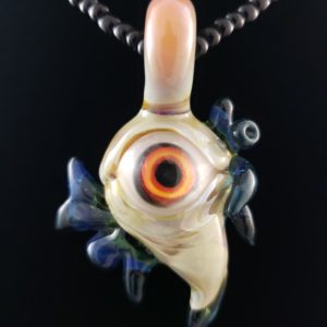 red yellow orange eye sea creature pendant with blue and green fins